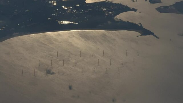 aerial view of 27 offshore wind farm turbines Teesside park at North Yorkshire coast, in the North Sea, England, Europe