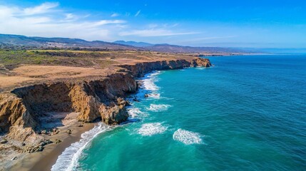 Aerial View of Waves Crashing on Coastal Cliffs