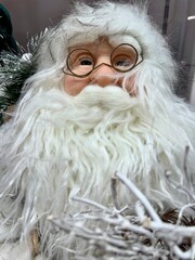 close-up of a Santa Claus figurine with his white beard for Christmas decoration
