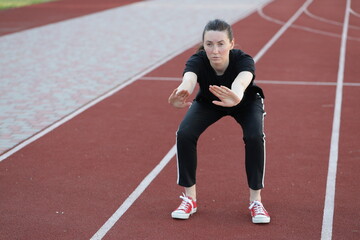 Woman doing workout exercises outside