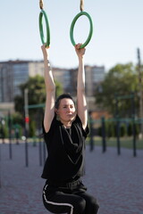 Woman doing workout exercises outside