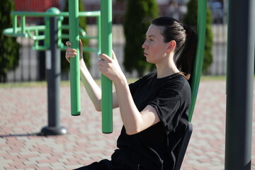 Woman doing workout exercises outside