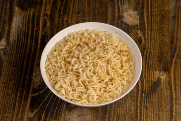 details of flour noodles with eggs during cooking
