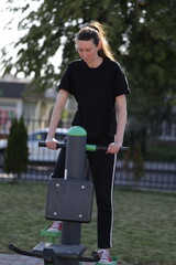 Woman doing workout exercises outside
