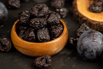 ripe purple plums and dried plums