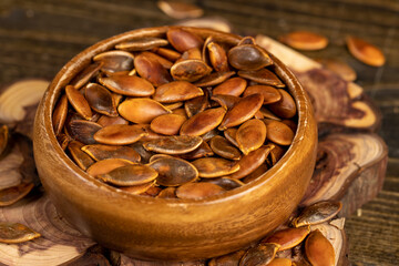 , overcooked or burnt pumpkin seeds on the table