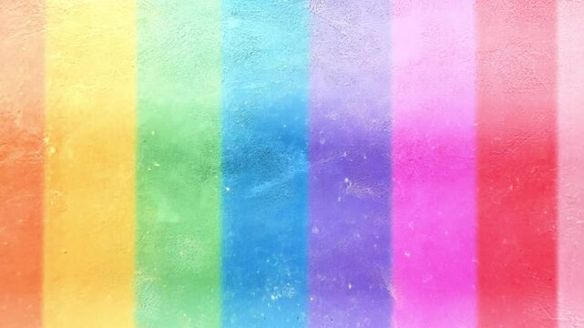 Vibrant rainbow pastel texture with soft hues and textured paper effect