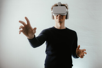 Young Man Experiencing Virtual Reality