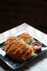 delicious dry ramen noodle with various topping chicken katsu