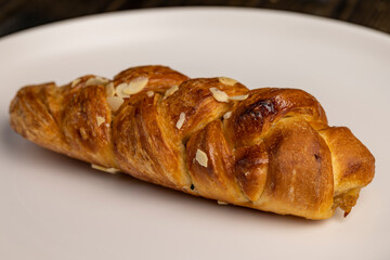 freshly baked wheat bun with filling and with cinnamon