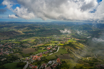 Fototapeta premium Scenic view from San Marino in foggy summer day, Italy, Europe 