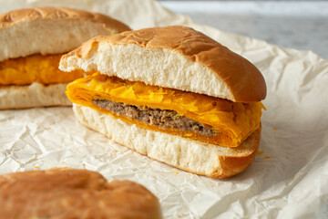 A view of coco bread beef patty sandwich.