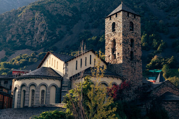 Fototapeta premium Historic architecture in Andorra surrounded by mountains during clear weather