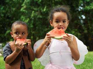 Children Eating Watermelon