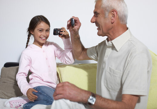 Grandfather and Granddaughter at Home