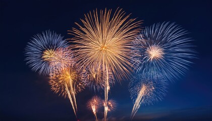 Colorful firework illumination on dark blue sky background for Happy New Year