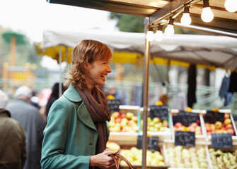 Woman Laughing at Outdoor Market