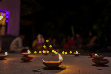 Davali, celebrated in a forest house, blends nature's serenity with vibrant traditions, featuring oil lamps, rangoli, sweets, and the soothing hum of nocturnal wildlife.