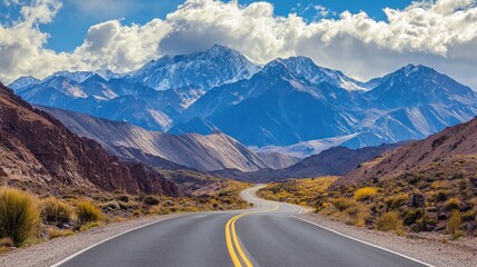 Scenic road winding through majestic mountains in a stunning natural park highlighting impressive peaks and breathtaking landscapes