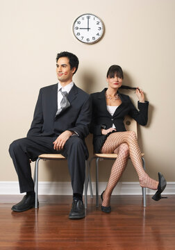 Woman and Man Flirting in Waiting Area