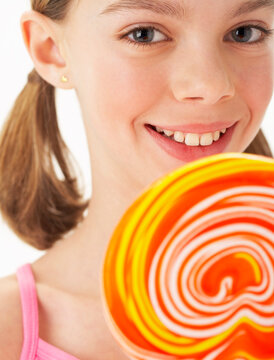 Girl Holding large Lollipop