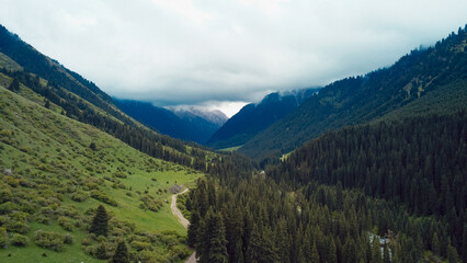 Breathtaking view of mountain valley in Kyrgyzstan under overcast skies during summer