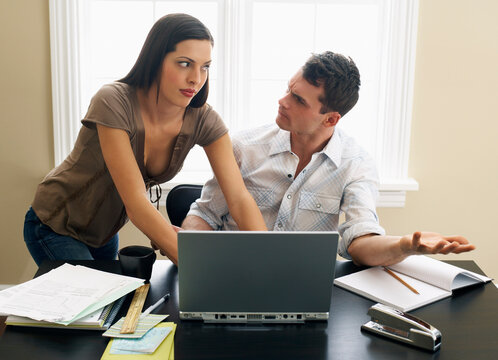Couple Paying Bills Online