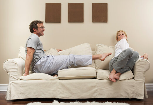 Couple Arguing on Sofa