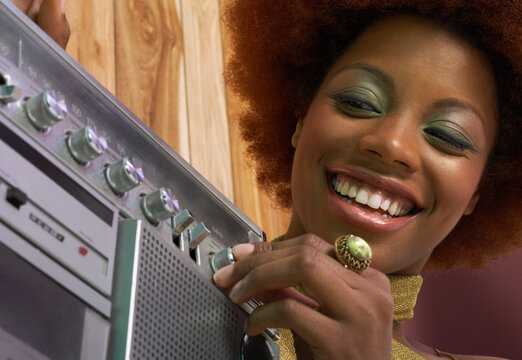 Woman Holding Boom Box