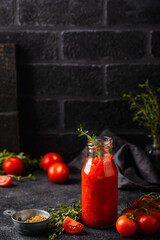 Homemade tomato sauce in glass bottle