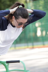 Woman exercising or doing workout session outside