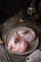 Marinated chicken breasts on plate