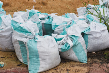 White and blue sandbags for flood protection