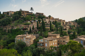 Fototapeta premium A hillside with houses and trees deia mallorca