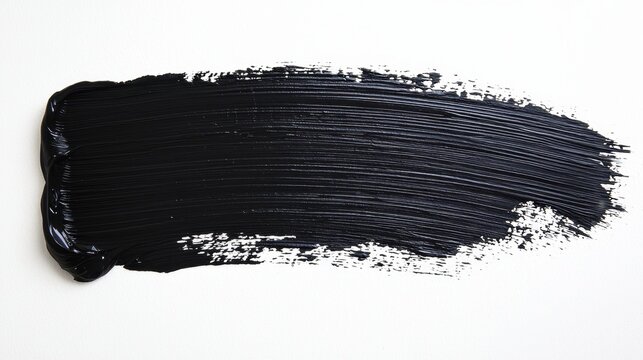 Black brush stroke of oil paint isolated on white background. Hand drawing brush line. Colorful realistic modern design element