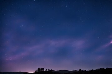 Fototapeta premium Deep blue evening sky filled with stars a touch of purple haze and faint wisps of clouds, AI Generated