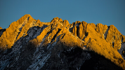 Sunset light on Fisher Range in Kananaskis Country, Alberta, viewed from the Golden Eagle Highway; Alberta, Canada