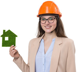 A girl in a construction helmet holds a green house. The concept of ecological clean housing.