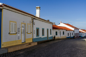 Housing painted in colour in the village of Odeceixe village in Portugal