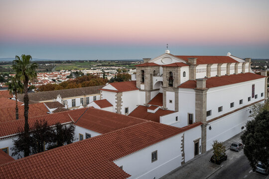 Buildings and cityscape of Evora, Portugal at sunset