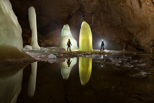 Meltwater and ice formations in the ice caves of the European Alps, threatened by global warming
