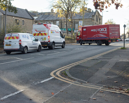 Royal Mail's Parcelforce lorry pulls out in front of white vans of Northern Powergrid and VLS illustrating how much commerce relies on the roads for their businesses