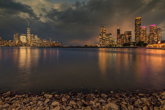 Lower Manhattan and Newport/Jersey City skylines at twilight viewed from Newport, NJ, USA; Newport, New Jersey,  United States of America