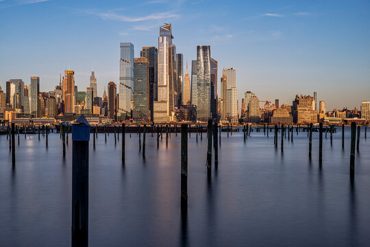 Empire State Building and Hudson Yards at sunset viewed from The Waterfront in Weehawken, NJ, USA; Weehawken, New Jersey, United States of America