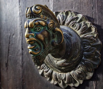 Close-up of Grotesque style door handle in Venice; Venice, Venice Province, Veneto Region, Italy