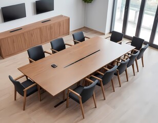 Modern conference room with a large wooden table and black chairs in a bright office