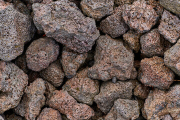Volcanic lava rock forming a textured background