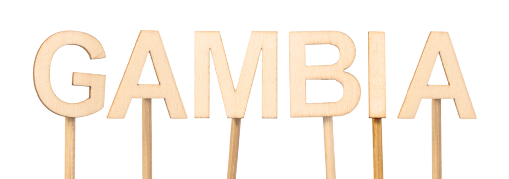 Name of Gambia in wooden letters on white background. Country in West Africa