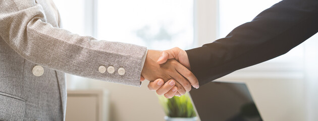 Successful asian young business woman, partnership, teamwork handshake or greeting together at...