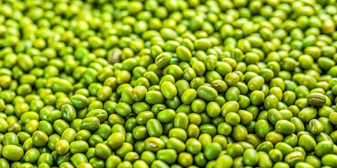 Close-up shot of vibrant green mung beans with small size ideal for food industry